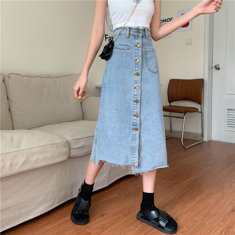Kvinnors lång denimkjol med knappslå och fransar Mirla-Eva Jonsson