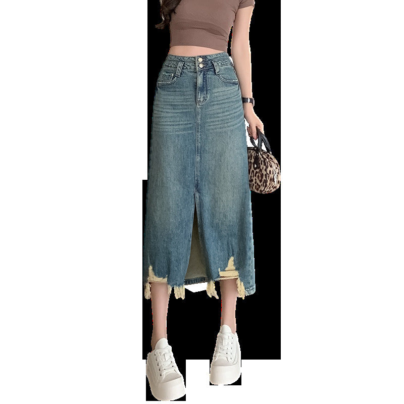 Kvinnors lång denimkjol med sidospalt och fransad fåll Mirla-Eva Jonsson
