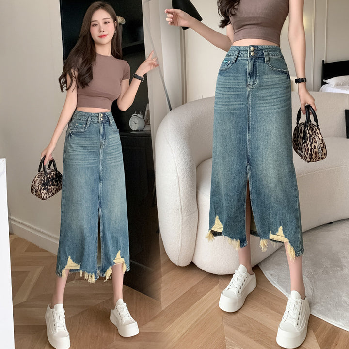 Kvinnors lång denimkjol med sidospalt och fransad fåll Mirla-Eva Jonsson