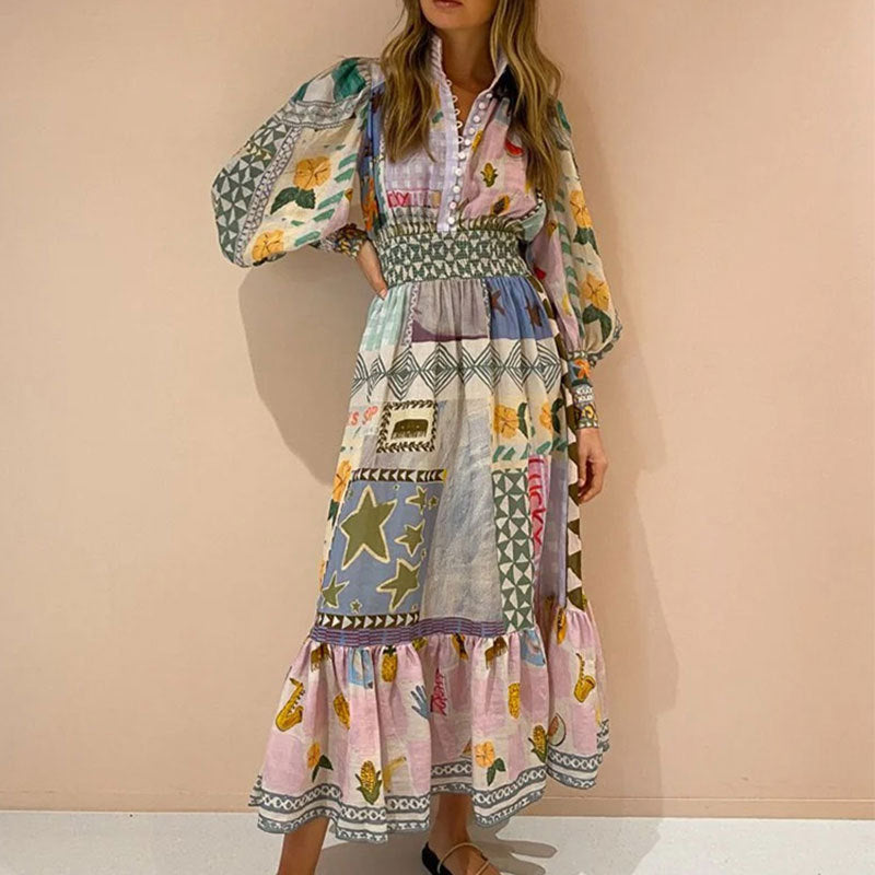 Kvinnors lång maxi klänning med färgglad patchwork mönster och voluminösa ärmar Mirla-Eva Jonsson