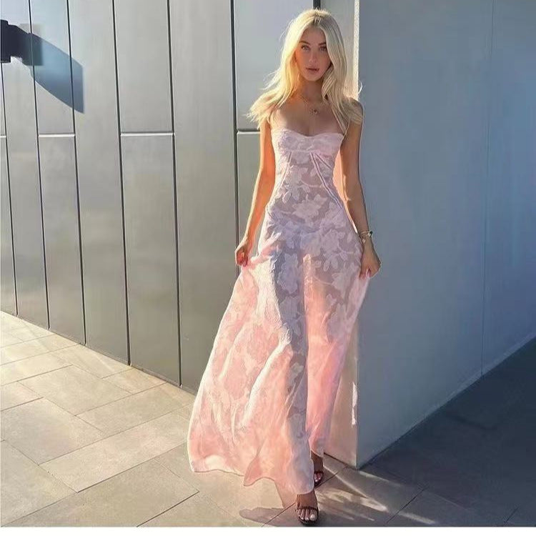 Kvinnors lång spetsklänning med transparent överdel och elegant skärning Mirla-Eva Jonsson