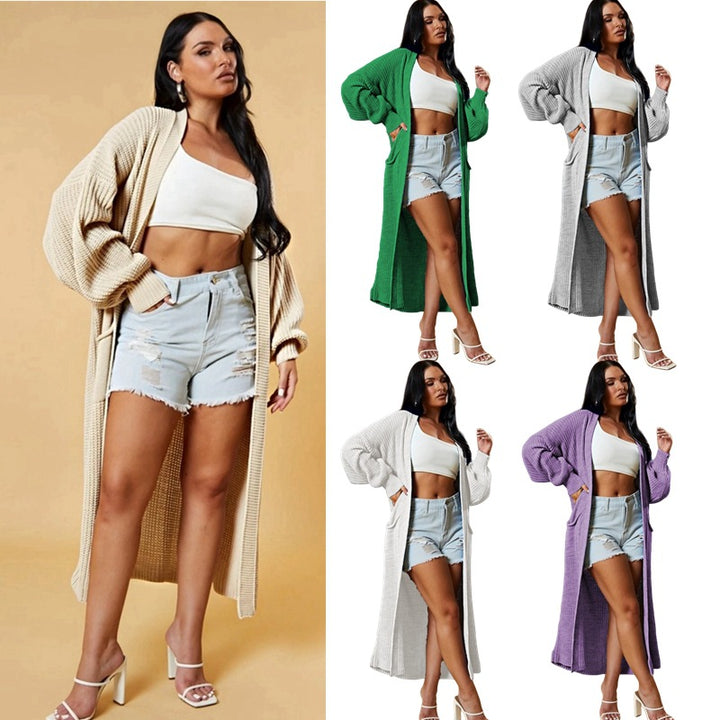 Kvinnors långa stickad cardigan med öppen design och praktiska fickor Mirla-Eva Jonsson