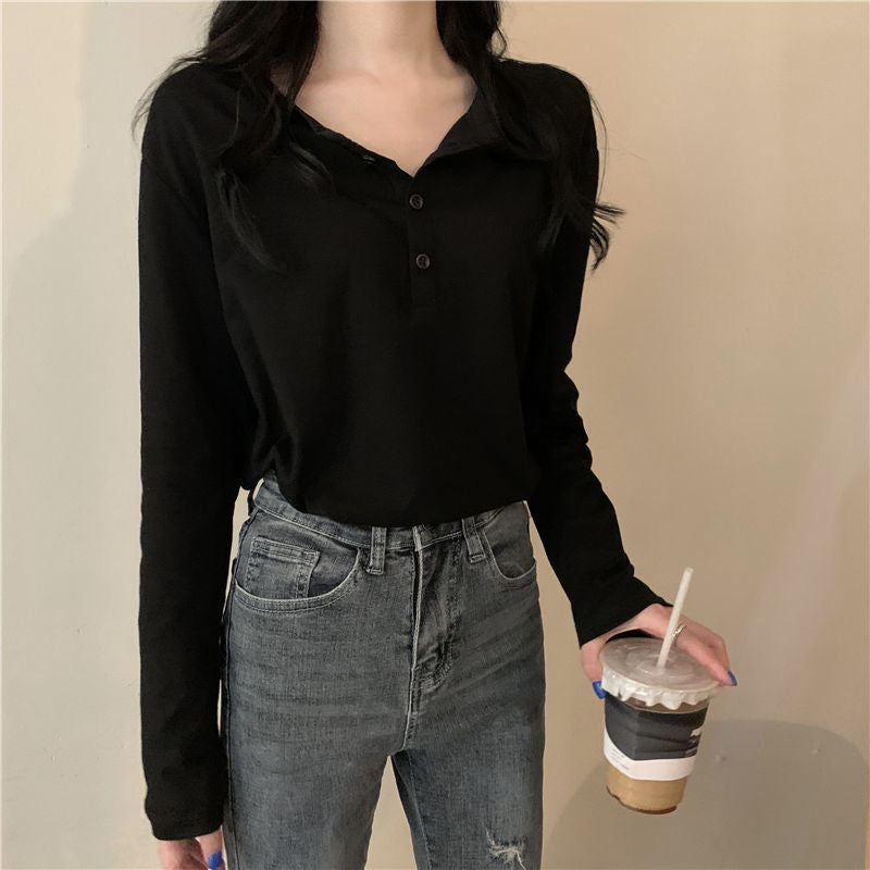 Kvinnors långärmad Henley-t-shirt med modern krage och kontinuerlig knappslå Mirla-Eva Jonsson