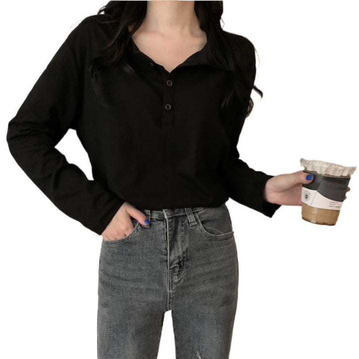 Kvinnors långärmad Henley-t-shirt med modern krage och kontinuerlig knappslå Mirla-Eva Jonsson