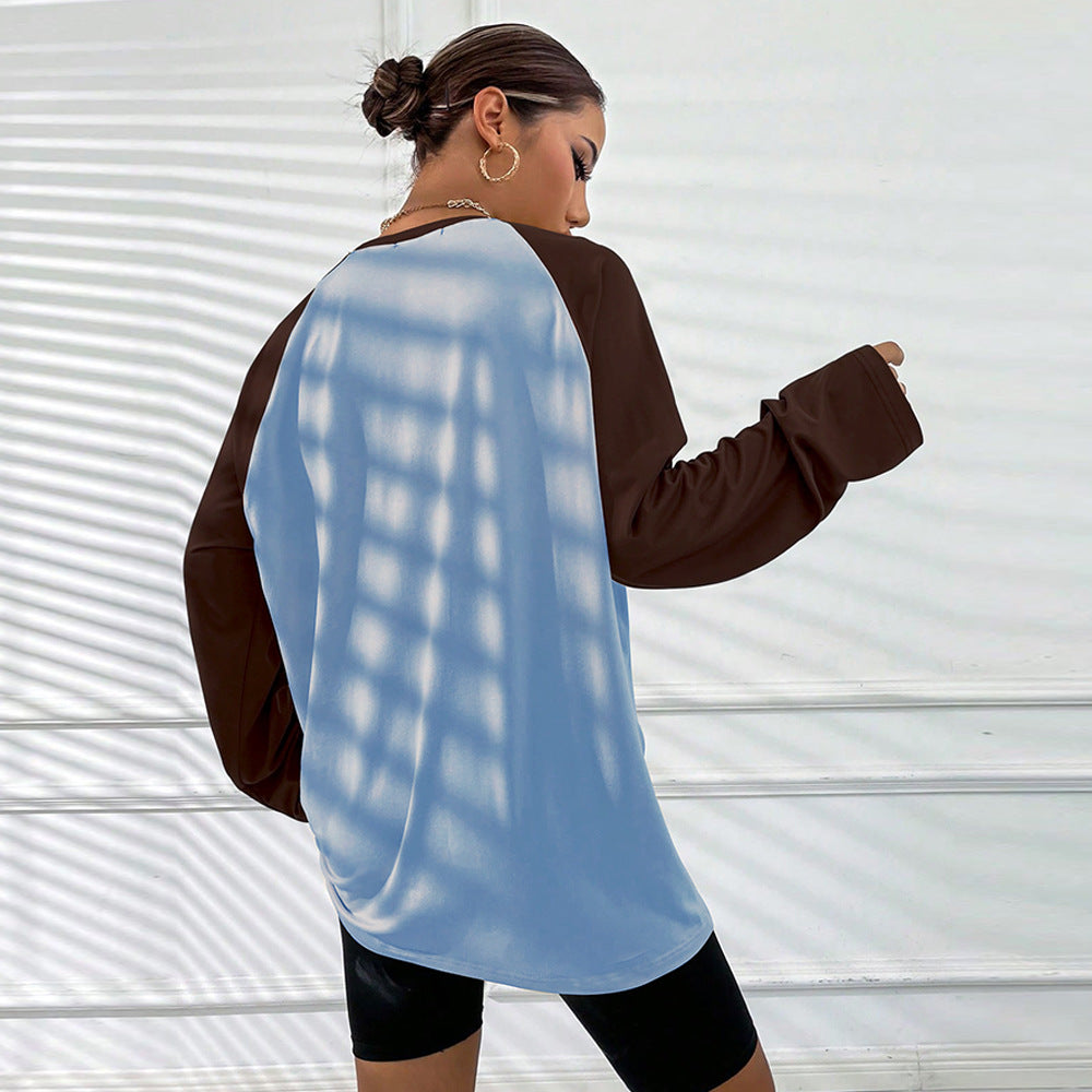 Kvinnors långärmad T-shirt med sportig raglanutseende och trendig färgblockdesign Mirla-Eva Jonsson