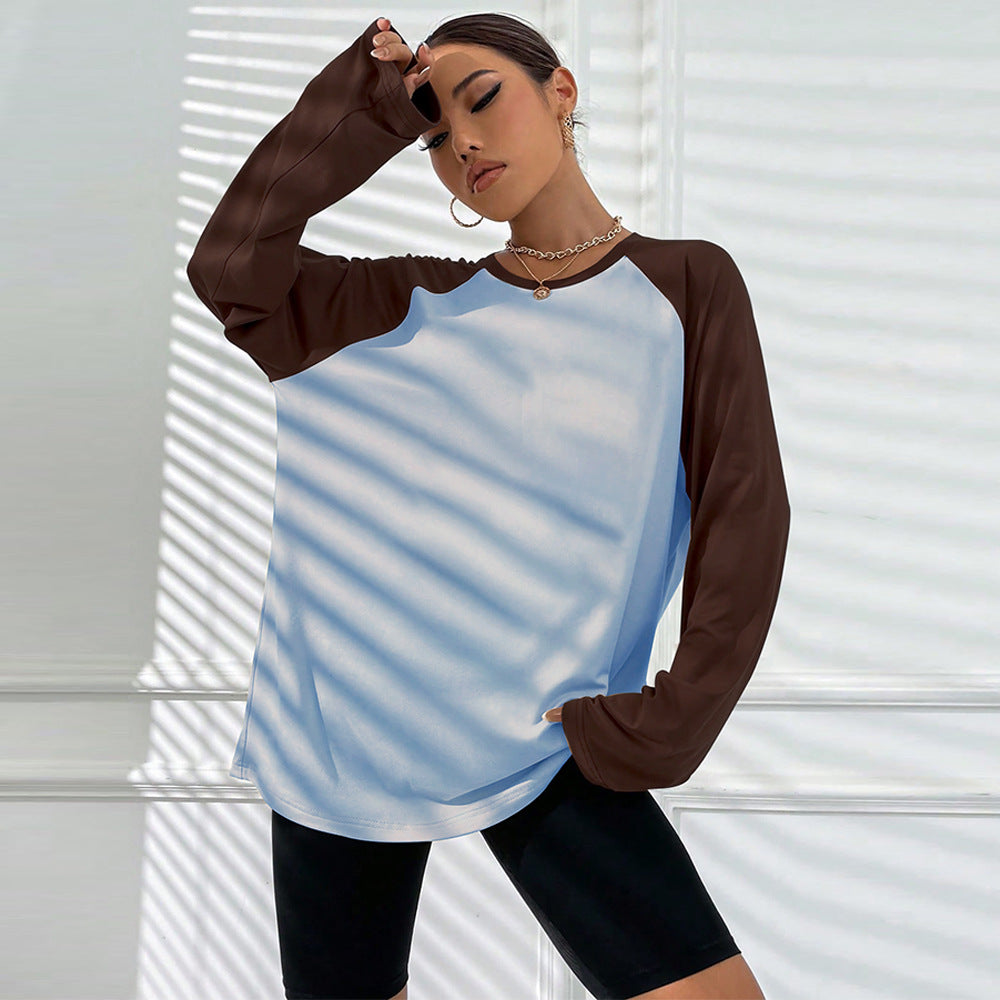 Kvinnors långärmad T-shirt med sportig raglanutseende och trendig färgblockdesign Mirla-Eva Jonsson