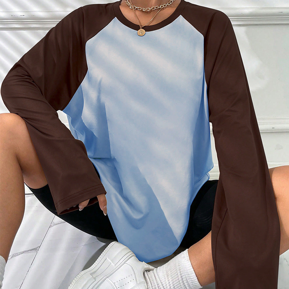 Kvinnors långärmad T-shirt med sportig raglanutseende och trendig färgblockdesign Mirla-Eva Jonsson