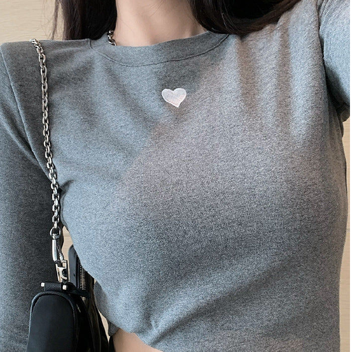 Kvinnors långärmad bas t-shirt med modernt hjärtmotiv Mirla-Eva Jonsson
