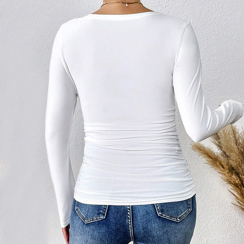 Kvinnors långärmad bodysuit med djup V-hals och figurskapande design Mirla-Eva Jonsson