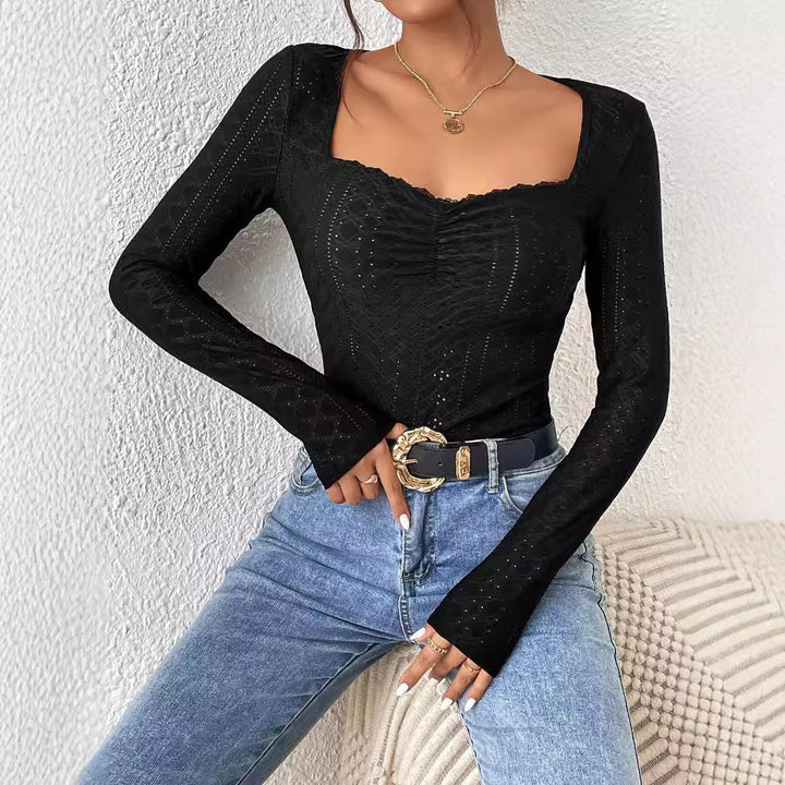 Kvinnors långärmad bodysuit med fyrkantig halsringning och eleganta volanger Mirla-Eva Jonsson