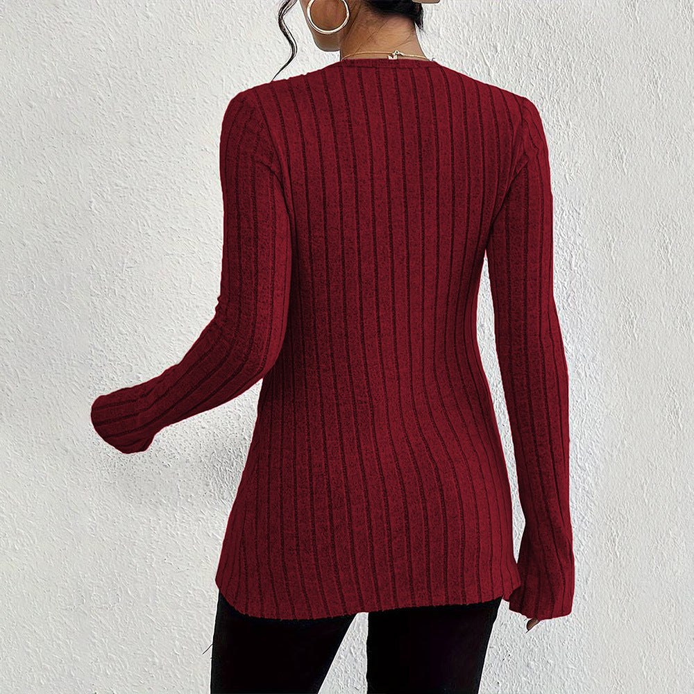 Kvinnors långärmad cardigan med fin ribbad textur och eleganta knappdetaljer Mirla-Eva Jonsson
