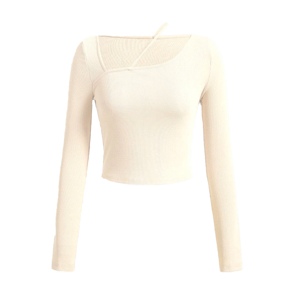 Kvinnors långärmad crop shirt med asymmetrisk halsringning och fin ribbad textur Mirla-Eva Jonsson