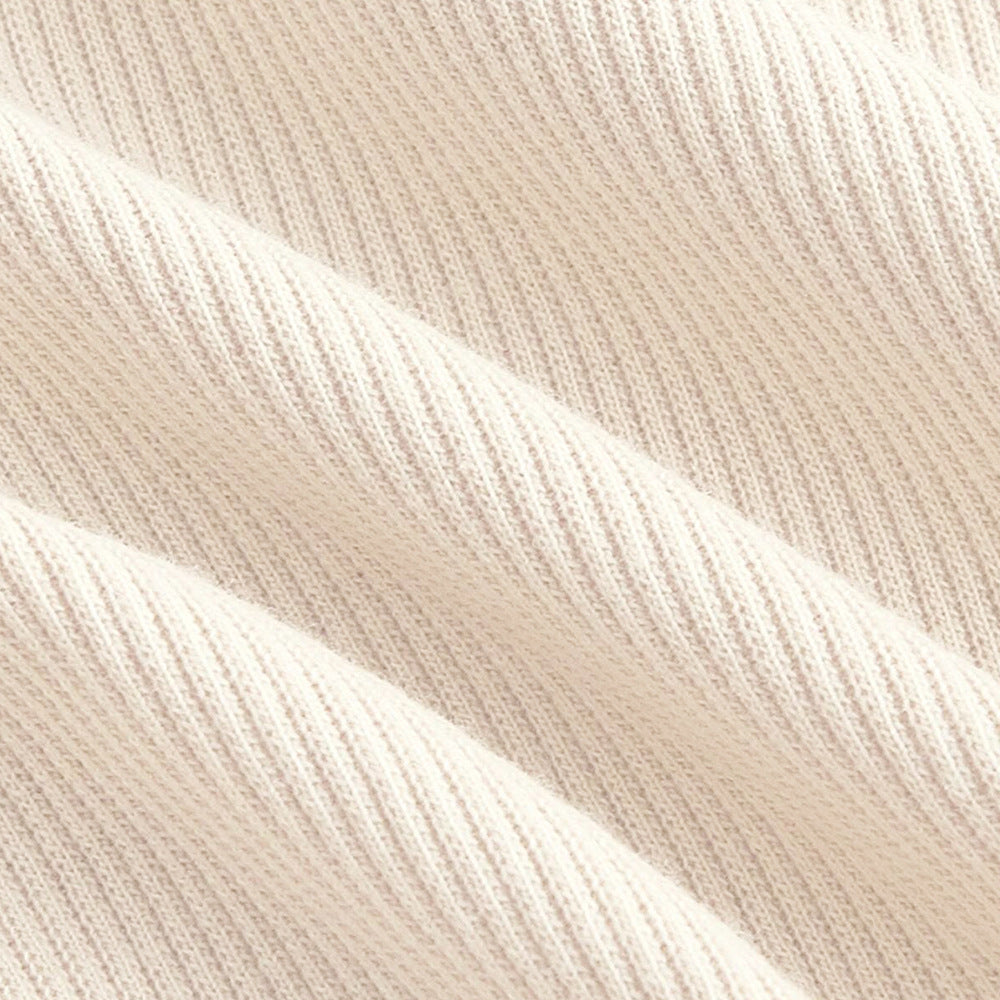 Kvinnors långärmad crop skjorta med asymmetrisk halsringning och fin ribbad textur Mirla-Eva Jonsson