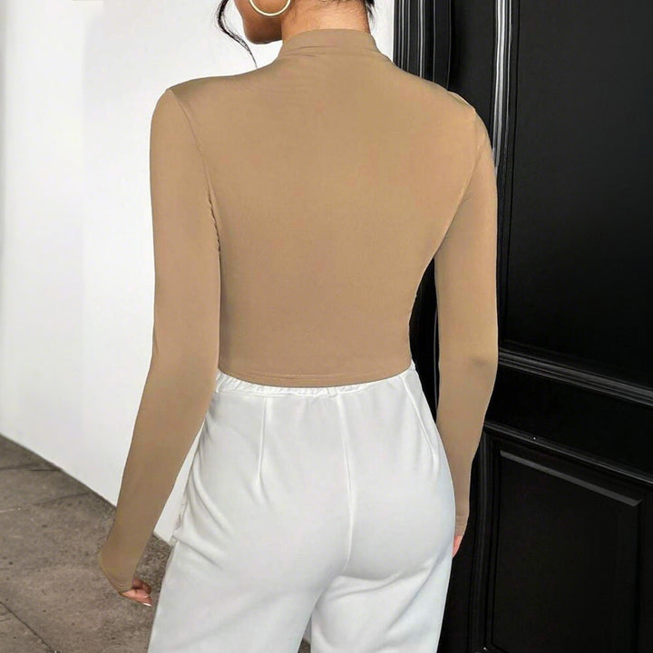 Kvinnors långärmad crop top med asymmetrisk drapering och elegant ståkrage Mirla-Eva Jonsson