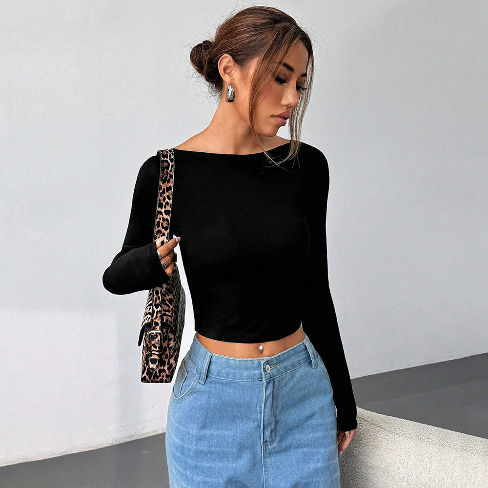 Kvinnors långärmad crop top med elegant rund halsringning och figursmickrande skärning Mirla-Eva Jonsson