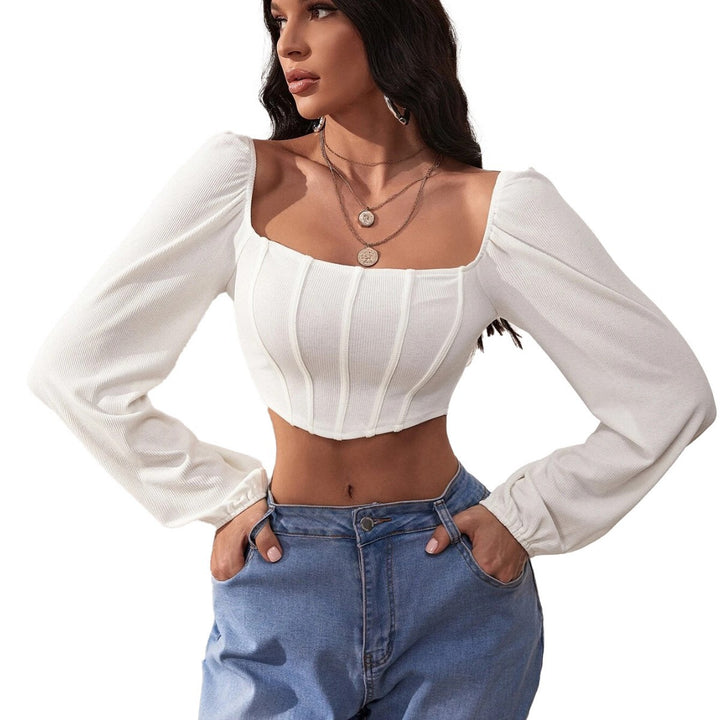 Kvinnors långärmad crop top med fyrkantig halsringning och eleganta puffärmar Mirla-Eva Jonsson