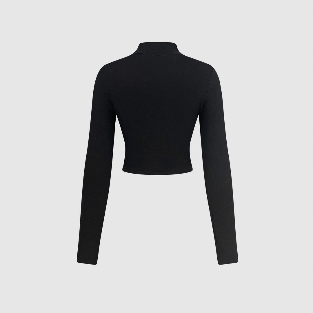 Kvinnors långärmad crop top med kreativt hjärtdesign Mirla-Eva Jonsson