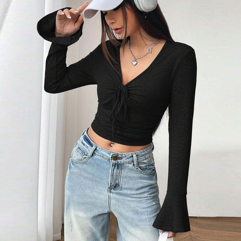 Kvinnors långärmad crop top med raffinerad knutdesign Mirla-Eva Jonsson