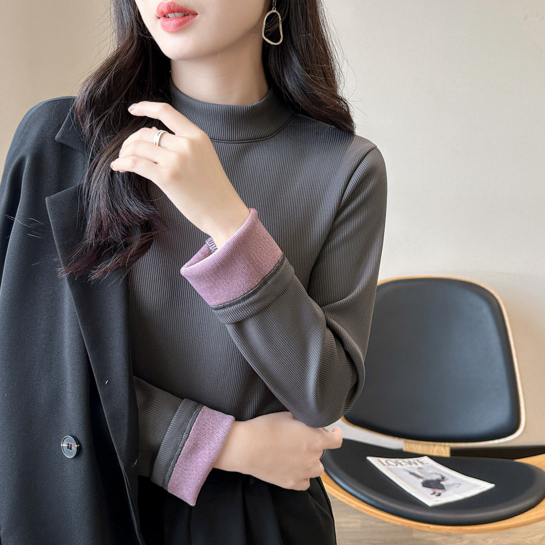 Kvinnors långärmad cropped topp med hög krage och ribbad textur Mirla-Eva Jonsson