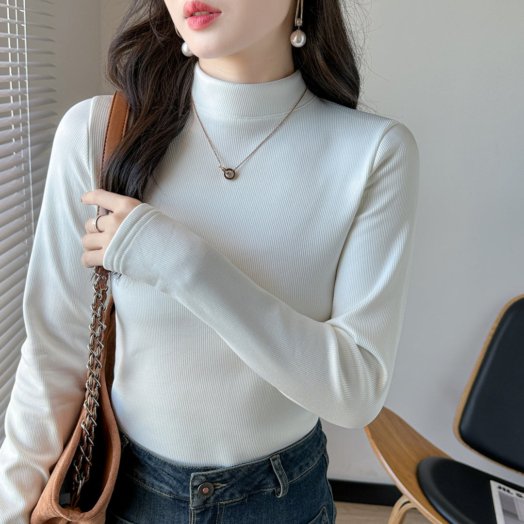 Kvinnors långärmad cropped topp med hög krage och ribbad textur Mirla-Eva Jonsson