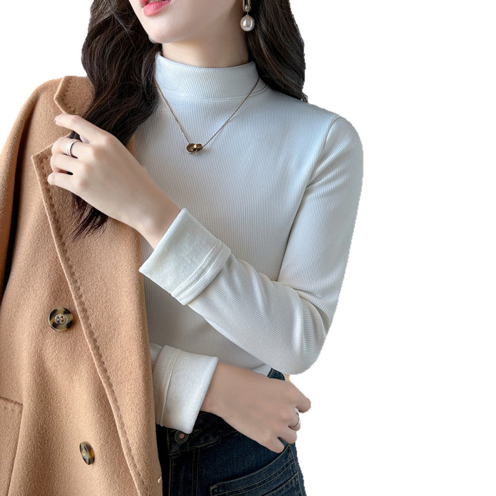 Kvinnors långärmad cropped topp med hög krage och ribbad textur Mirla-Eva Jonsson