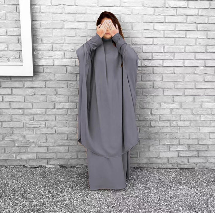 Kvinnors långärmad kaftan med elegant snitt och bred design Mirla-Eva Jonsson