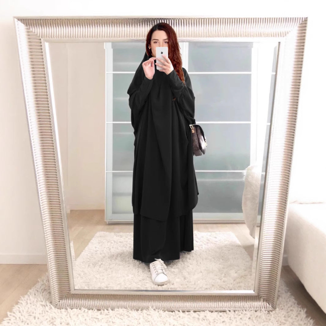 Kvinnors långärmad kaftan med elegant snitt och bred design Mirla-Eva Jonsson