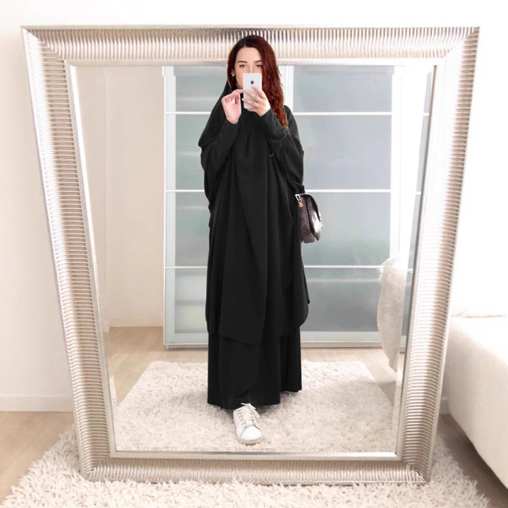 Kvinnors långärmad kaftan med elegant snitt och bred design Mirla-Eva Jonsson
