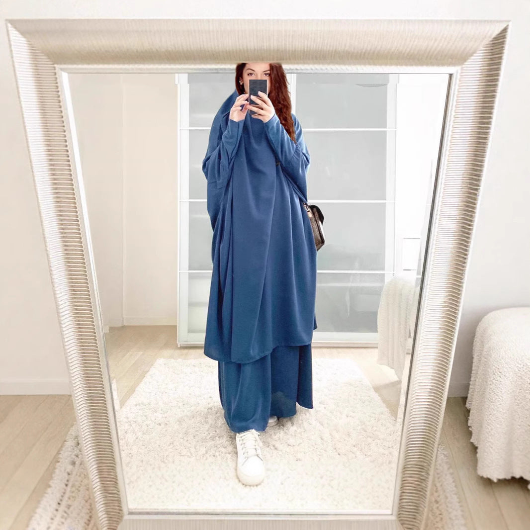 Kvinnors långärmad kaftan med elegant snitt och bred design Mirla-Eva Jonsson