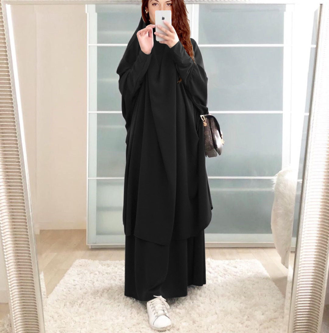 Kvinnors långärmad kaftan med elegant snitt och bred design Mirla-Eva Jonsson