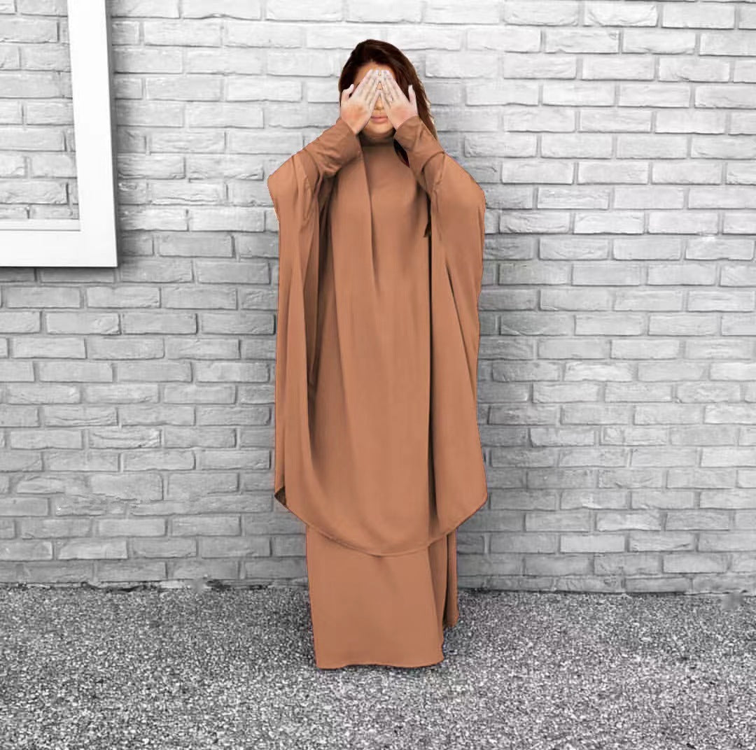 Kvinnors långärmad kaftan med elegant snitt och bred design Mirla-Eva Jonsson