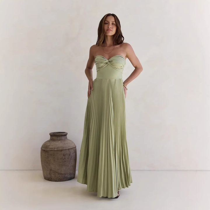 Kvinnors långärmad plisserad klänning med elegant topp och flödande kjol Mirla-Eva Jonsson