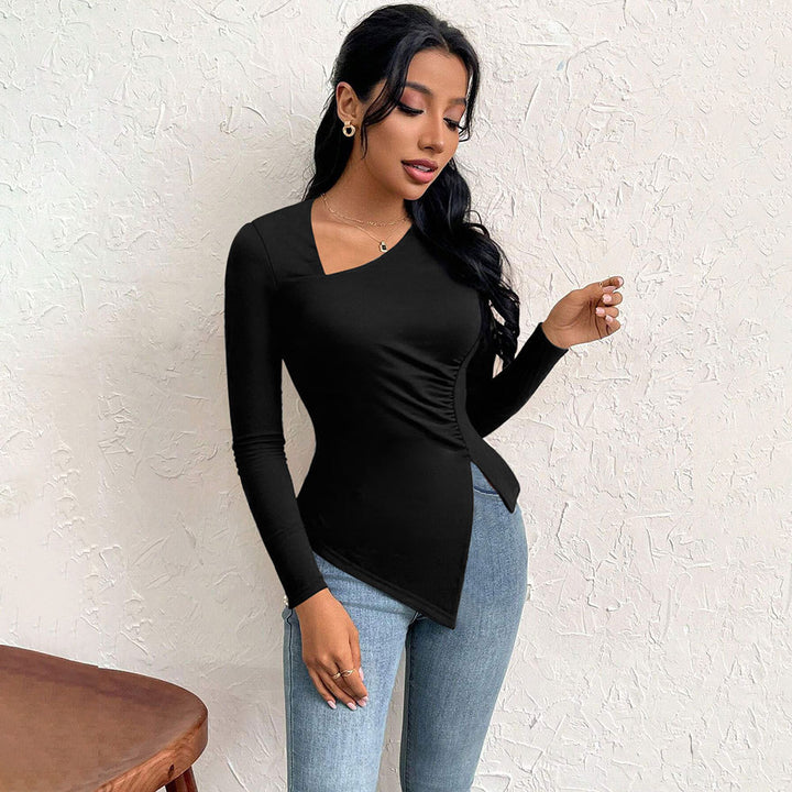 Kvinnors långärmad skjorta med asymmetrisk skärning och moderiktig drapering Mirla-Eva Jonsson