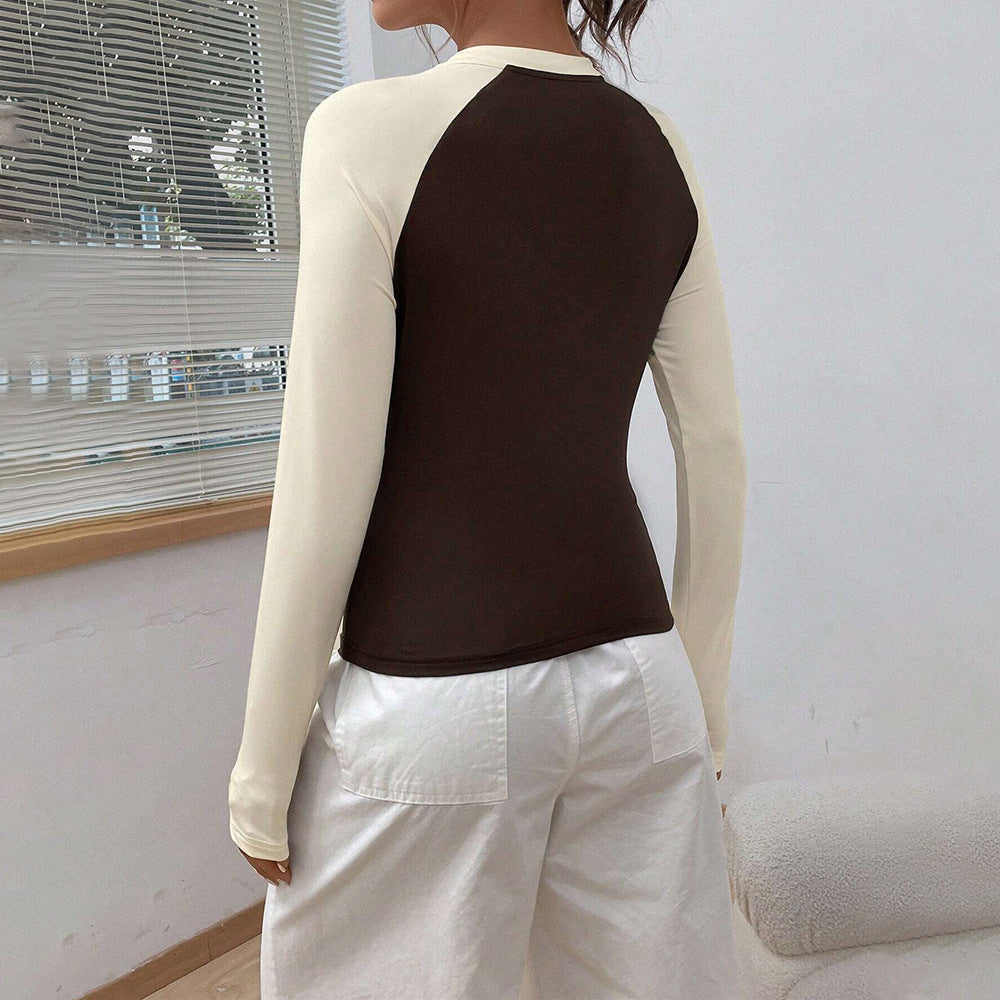 Kvinnors långärmad skjorta med modernt raglan-design och figurnära passform Mirla-Eva Jonsson