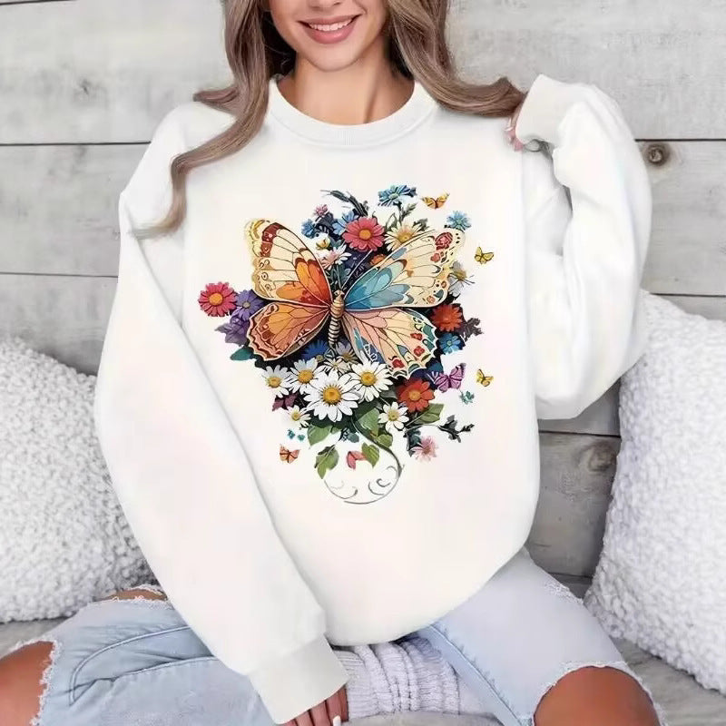 Kvinnors långärmad sweatshirt med blommigt fjärilstryck Mirla-Eva Jonsson