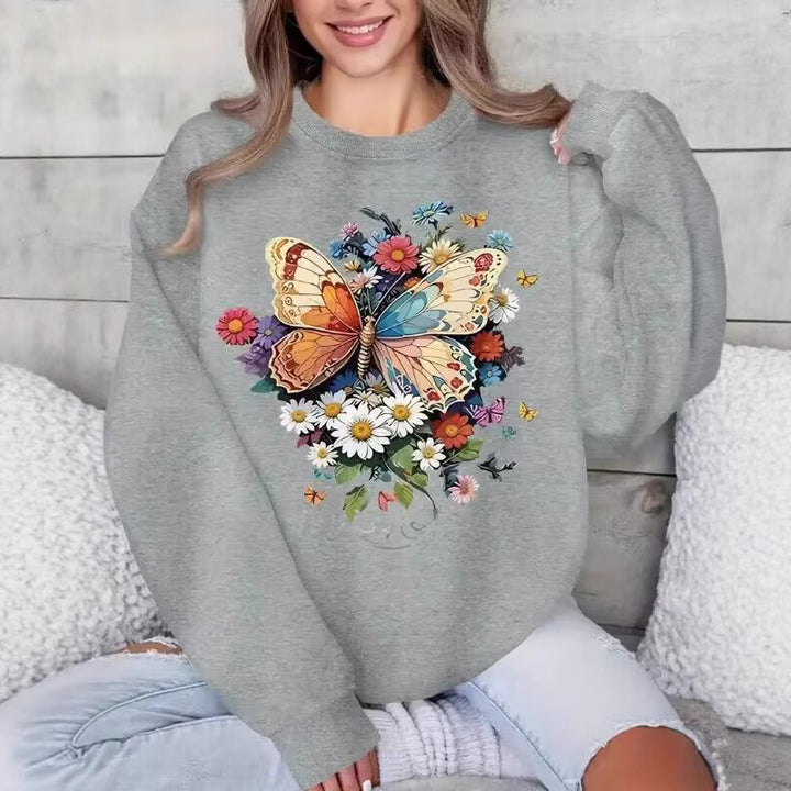 Kvinnors långärmad sweatshirt med blommigt fjärilstryck Mirla-Eva Jonsson
