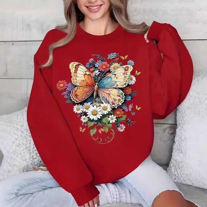 Kvinnors långärmad sweatshirt med blommigt fjärilstryck Mirla-Eva Jonsson