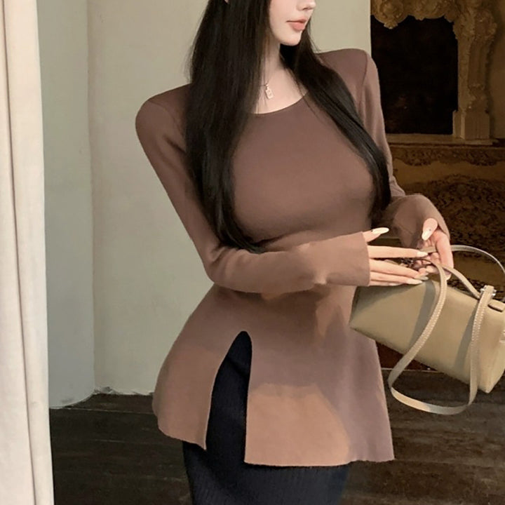 Kvinnors långärmad topp med asymmetrisk skärning och elegant detalj-Eva Jonsson