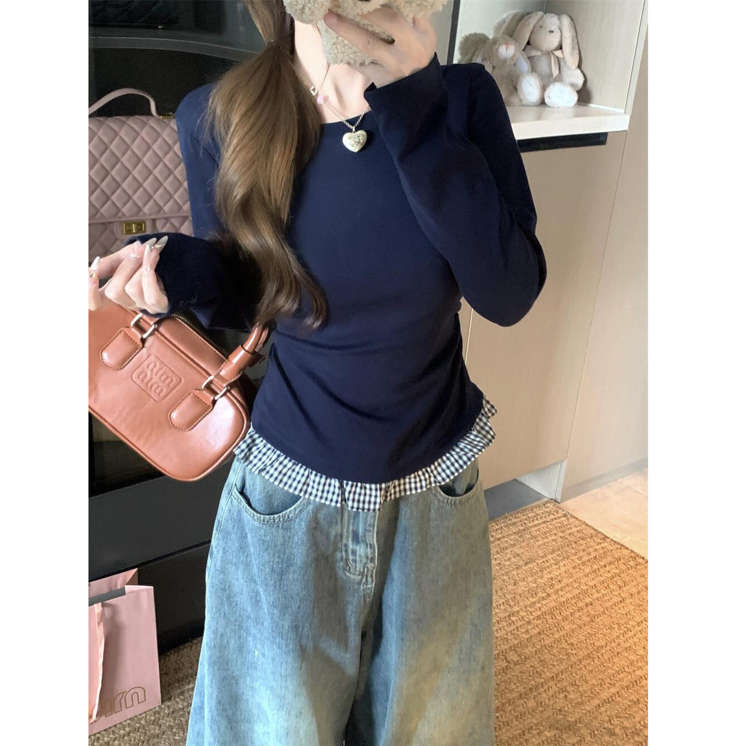 Kvinnors långärmad topp med elegant omslagseffekt Mirla-Eva Jonsson