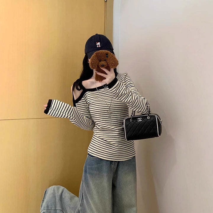Kvinnors långärmad topp med off-shoulder design och trendiga ränder Mirla-Eva Jonsson