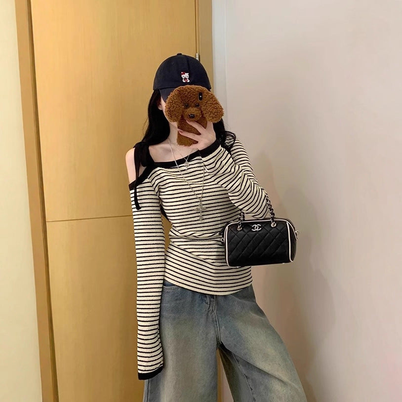Kvinnors långärmad topp med off-shoulder design och trendiga ränder Mirla-Eva Jonsson