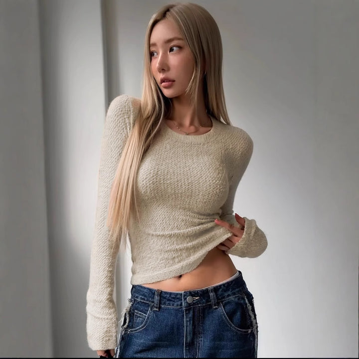 Kvinnors långärmad topp med texturerat mönster och avslappnad passform Mirla-Eva Jonsson