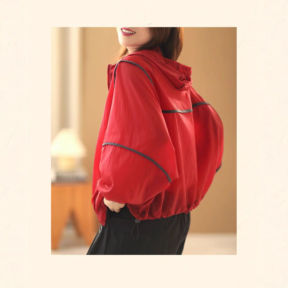 Kvinnors lätta hoodie-jacka med elastisk nederkant och reflekterande detaljer Mirla-Eva Jonsson