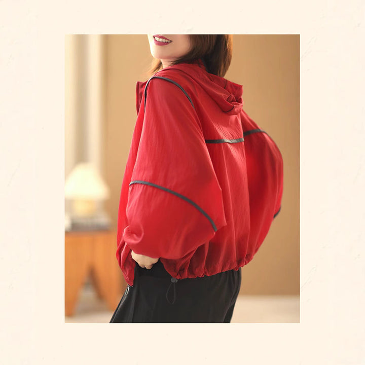 Kvinnors lätta hoodie-jacka med elastisk nederkant och reflekterande detaljer Mirla-Eva Jonsson
