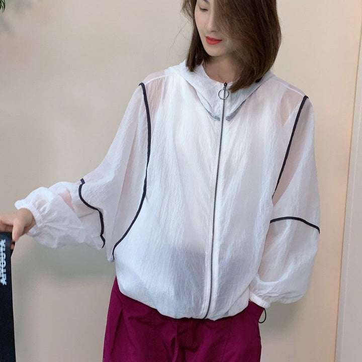 Kvinnors lätta hoodie-jacka med elastisk nederkant och reflekterande detaljer Mirla-Eva Jonsson