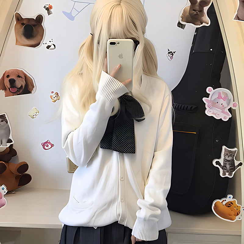 Kvinnors lekfulla cardigan med stora krage och rosett detaljer Mirla-Eva Jonsson