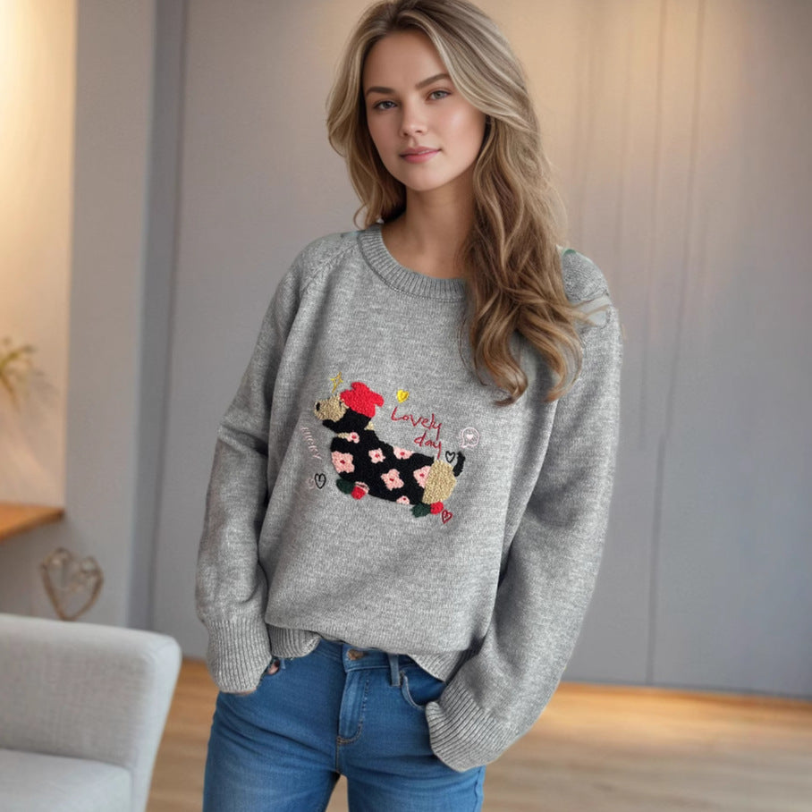 Kvinnors lekfulla sweatshirt med unik djurdesign och blomsterbroderi Mirla-Eva Jonsson