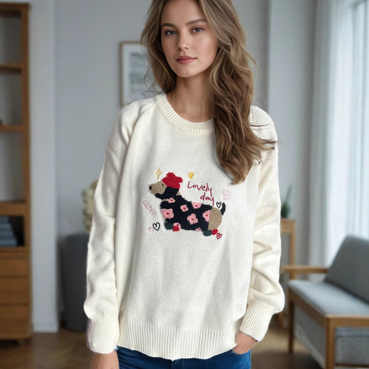 Kvinnors lekfulla sweatshirt med unik djurdesign och blomsterbroderi Mirla-Eva Jonsson