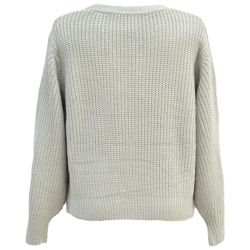 Kvinnors lös cardigan med V-hals och knappdetaljer Mirla-Eva Jonsson