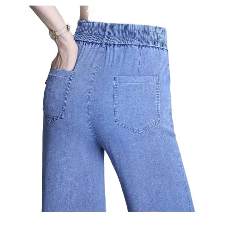 Kvinnors lösa jeans med elastisk midja och praktiska fickor Mirla-Eva Jonsson